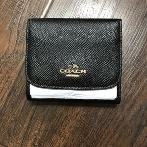 Brand new Leather Coach wallet.